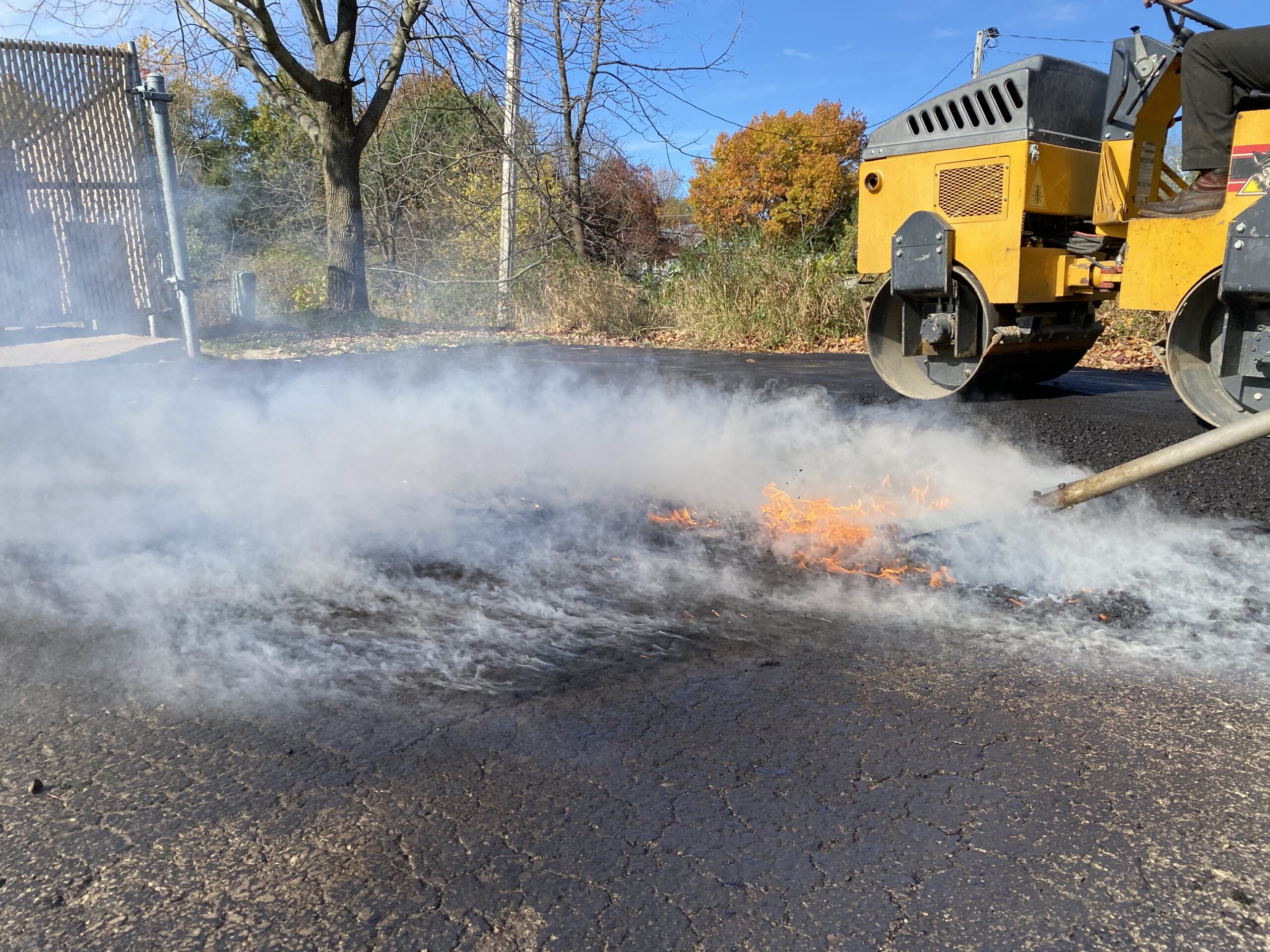 Mastering Hot Patch Repairs with an Asphalt Roller