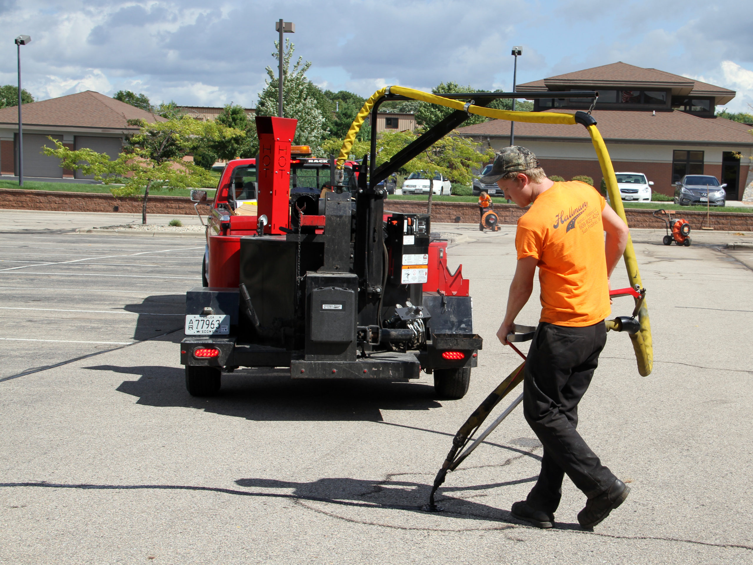 4 Reasons to Crack Fill Your Parking Lot in Madison, WI